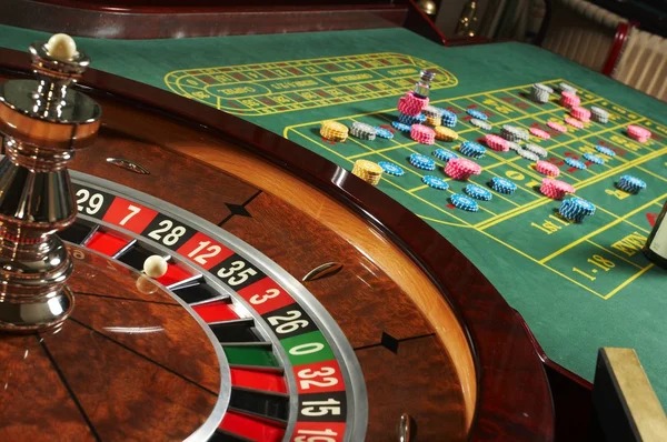hasilwin platform interface showing football markets, live casino tables, and slots on mobile device